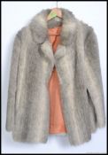 A 1950's vintage ladies fur coat with re