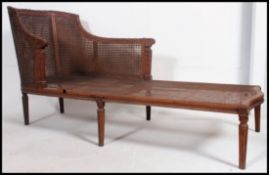 A circa 19th century twin caned bergere