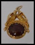 A beautiful 9ct gold and agate twin eagl