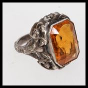 A 925 silver ring with large yellow face