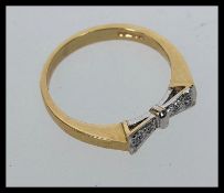 A hallmarked 9ct gold ring with pave set