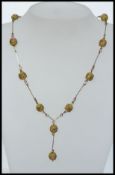 A 1930s Czech glass and rolled gold neck