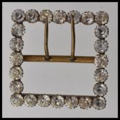 A Victorian square buckle set with paste