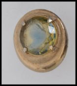 A large vintage  gold tone brooch with c