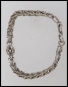 A vintage white metal Byzantine bone li