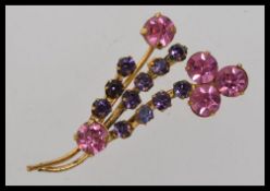 A vintage yellow metal pink and purple r