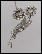A good 1950s flower spray diamonte brooc