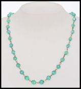 A 1930s Czech rolled gold and faceted tu