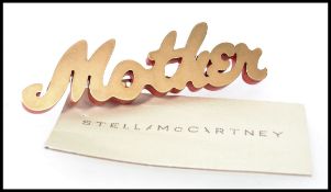 Designer Stella McCartney gold tone Moth