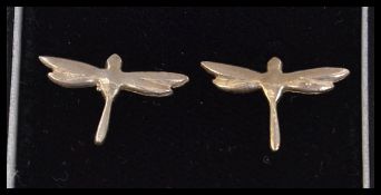 A pair of 925 silver dragonfly earnings