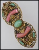 A 1920s Czech yellow metal cloak clip cl