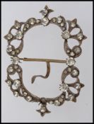 A large Victorian white metal belt buckl