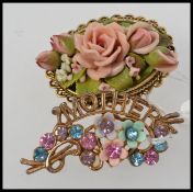 A vintage metal rhinestone and celluloid