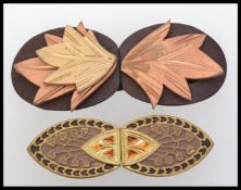 Two 1930s bakelite cloak cape clip clasp