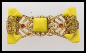 A 1930s Bohemian bakelite and yellow met
