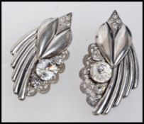 A pair of 1930s white metal dress clips