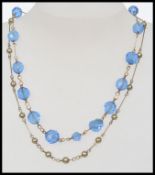 A 1930s Czech glass and rolled gold neck