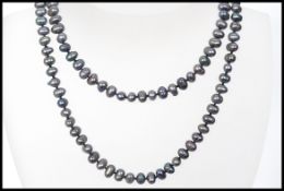 A vintage black baroque pearl necklace w