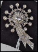 A large white metal vintage comet star b