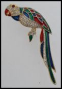 A large vintage parrot brooch decorated