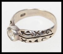 A contemporary 925 silver band ring with