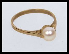 A hallmarked 9ct gold dress ring with so
