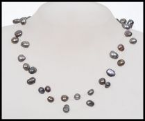 A contemporary triple string baroque pea