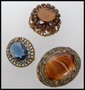 Three large vintage brooches set with ag