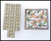 A large 1930s white metal and paste dres