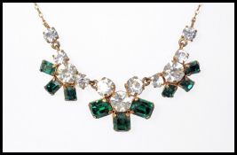 A vintage jewellery suite consisting of