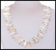 A stick pearl choker necklace with 925 s