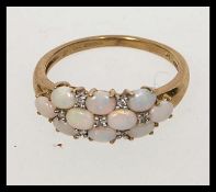 A hallmarked 9ct gold dress ring set wit