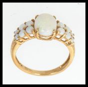 A hallmarked 9ct gold dress ring set wit