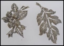 Two large vintage white metal and marcas