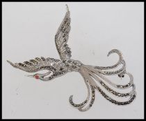 A large vintage silver and marcasite bro