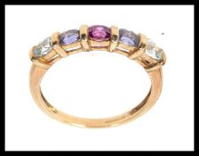 A hallmarked  9ct gold half eternity rin