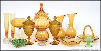 A collection of coloured glass dating from across the 20th century to include pressed glass and