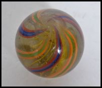 A good Victorian 19th century large spiral multi colour helix twist marble.