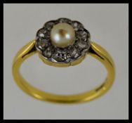 A vintage 18ct gold diamond and pearl ladies ring,
