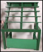 A large vintage florists / greenhouse plant flower display stand.