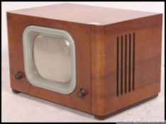 A vintage wooden cased mid 20th century television
