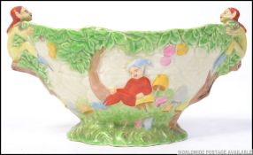 A Royal Wintons Grimwades flower bowl having with decorative forest and fairy scene with frog to