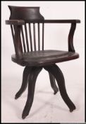 A Victorian mahogany Industrial office swivel desk chair.