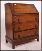 A 1930's oak bureau desk.