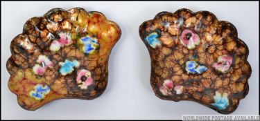 2 stunning Industrial arts Scandinavian enamel set oyster dishes of highly decorative form.