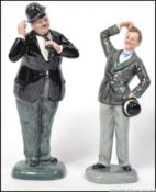Royal Doulton Laurel and Hardy , Stan Laurel HN2774 607/9500 and Oliver Hardy HN2775 607/9500.