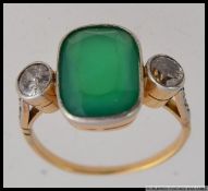 18CT Y/G impressive emerald and diamond ring the central emerald of 6ct's approx. RS M.