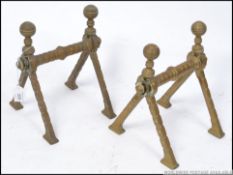 A stunning pair of Victorian Arts & Crafts movement andirons / fire dogs.