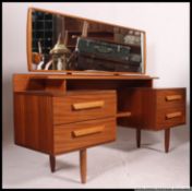 A vintage / retro floating shelf dresser / sideboard with twin pedestal drawers either side having