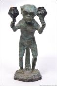 An unusual early 20th century spelter metal statue of an Indian monkey,